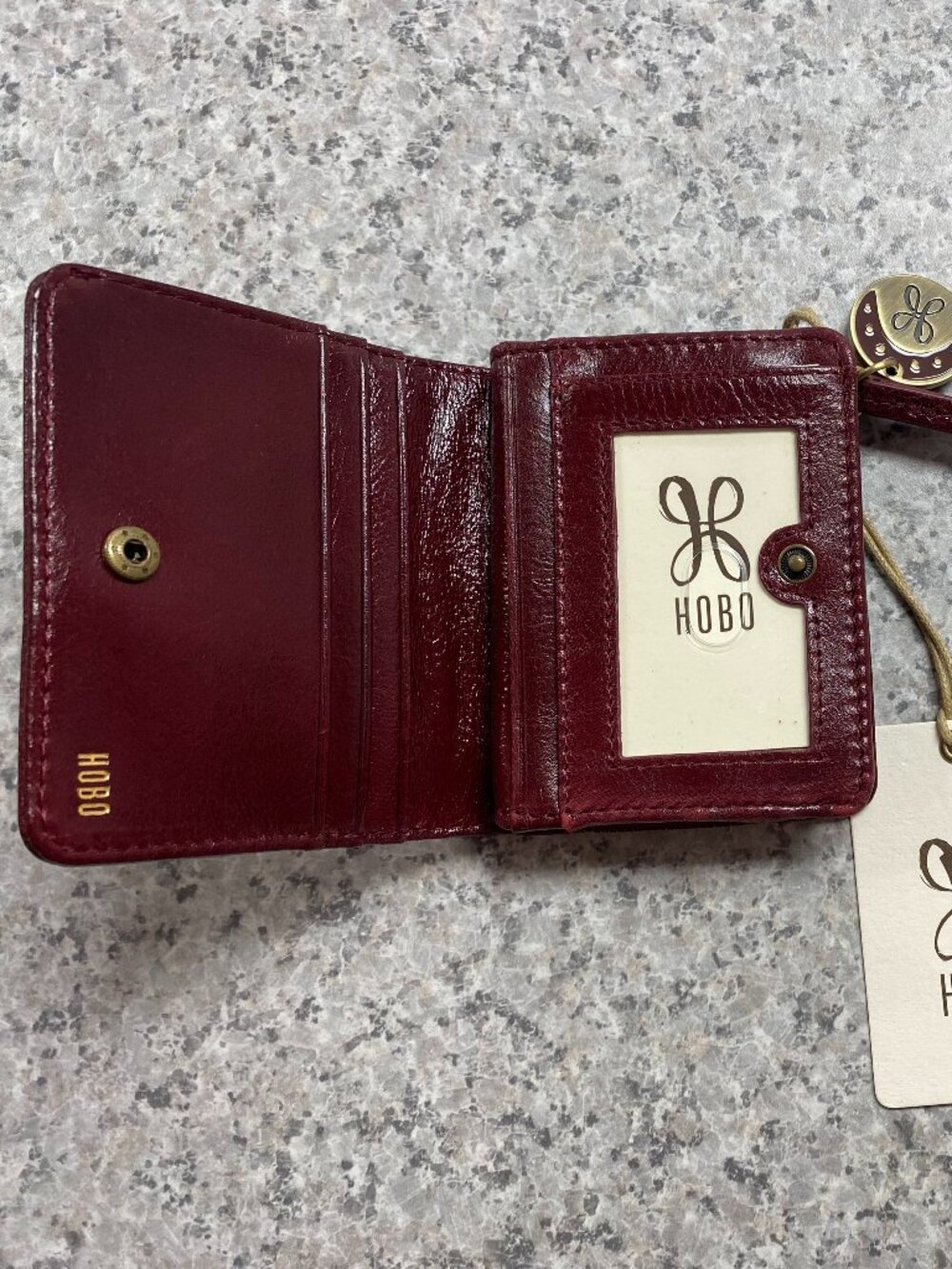 HOBO Coin Wristlet in Garnet Gloss